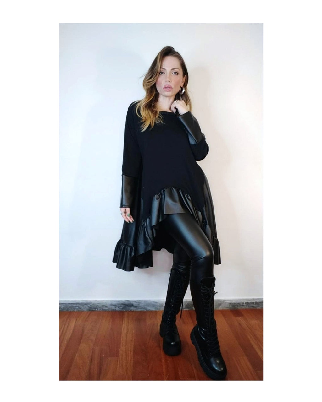 Faux leather and fabric flared sweater!