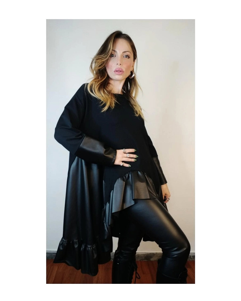 Faux leather and fabric flared sweater!