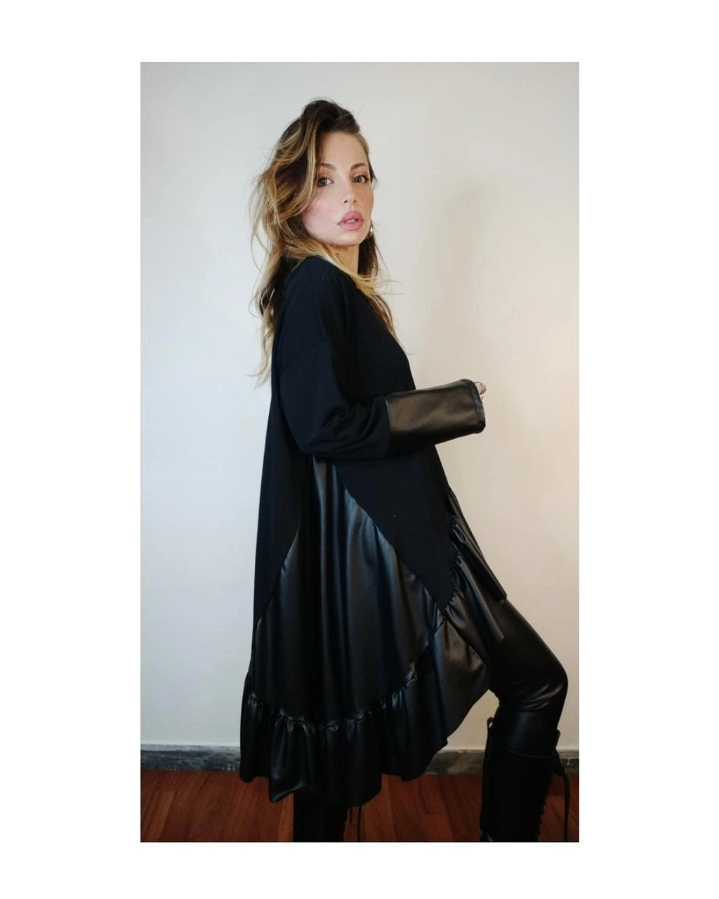 Faux leather and fabric flared sweater!