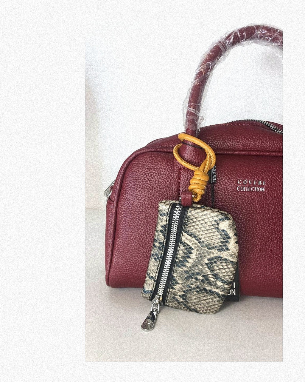 Borsa ecopelle mezzaluna con tracolla Coveri Collection!